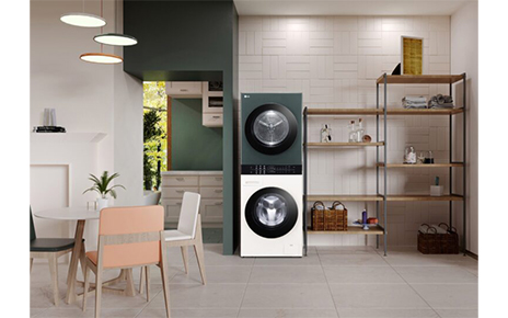 LG’s new WashTowerTM Compact Objet Collection is placed in the utility room next to the shelves.