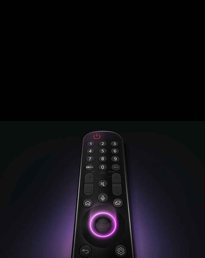 An LG Magic Remote with the middle circular button, as neon purple light emanates around the button to highlight them. A soft purple glow surrounds the remote on a black background.