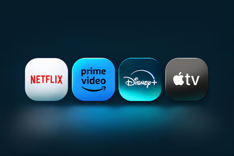 Displays icons of popular LG smart TV webOS streaming apps: Netflix, Prime Video, Disney+, and Apple TV, set against a dark background 